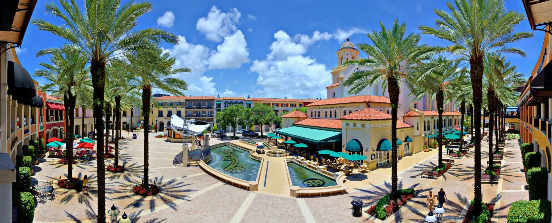 West Palm Beach, Florida, USA - June 26, 2013: Pedestrians walk through City Place. The mixed-use development is an upscale downtown lifestyle center opened in 2000.